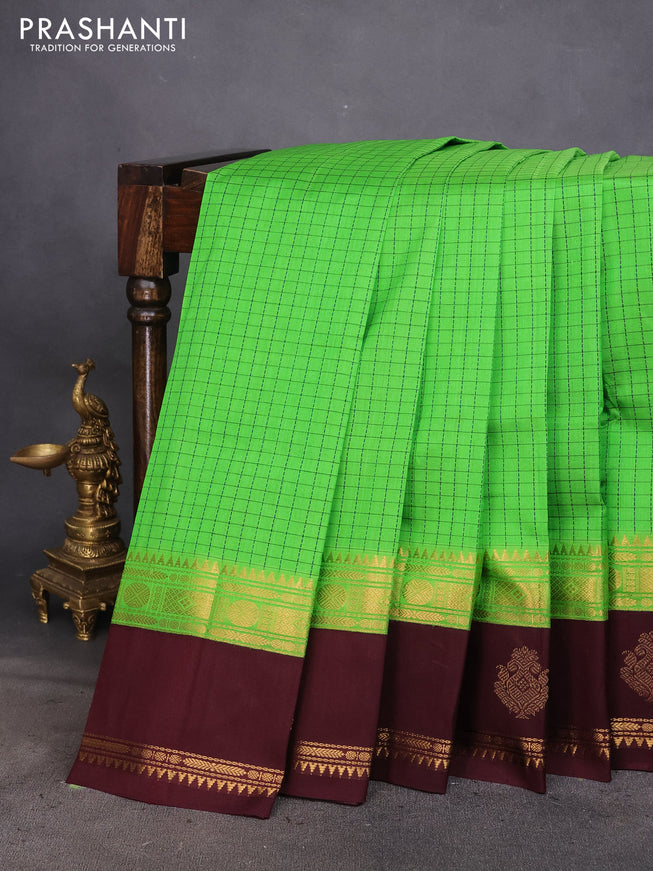 Silk cotton saree green and coffee brown with allover thread checked pattern and rettapet zari woven korvai butta border