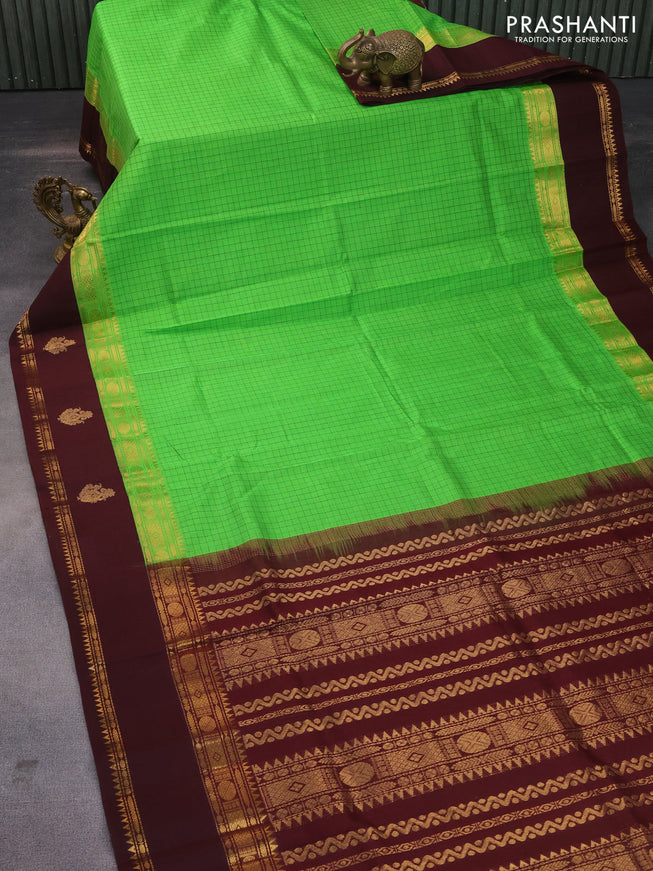 Silk cotton saree green and coffee brown with allover thread checked pattern and rettapet zari woven korvai butta border