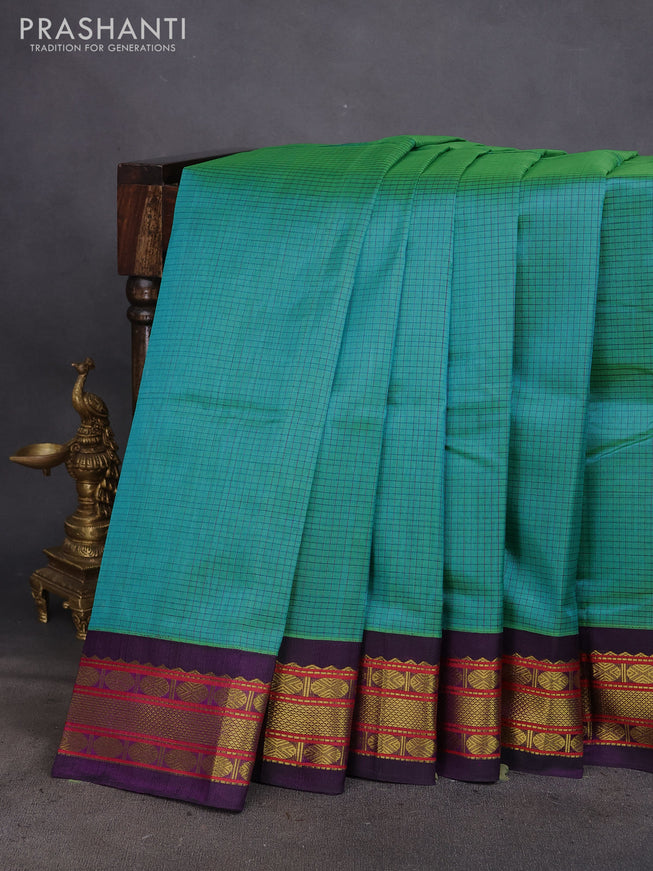 Silk cotton saree dual shade of teal green and deep violet with allover thread checked pattern and zari woven korvai border