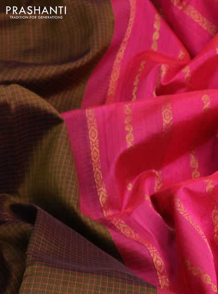 Silk cotton saree dark mehendi green and pink with allover thread checked pattern and zari woven korvai border