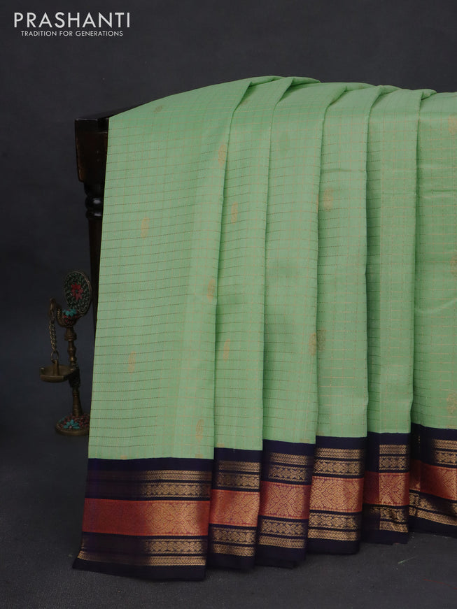 Silk cotton saree pista green and navy blue with zari woven checks & buttas and zari woven korvai border