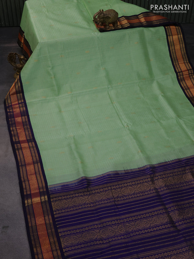 Silk cotton saree pista green and navy blue with zari woven checks & buttas and zari woven korvai border