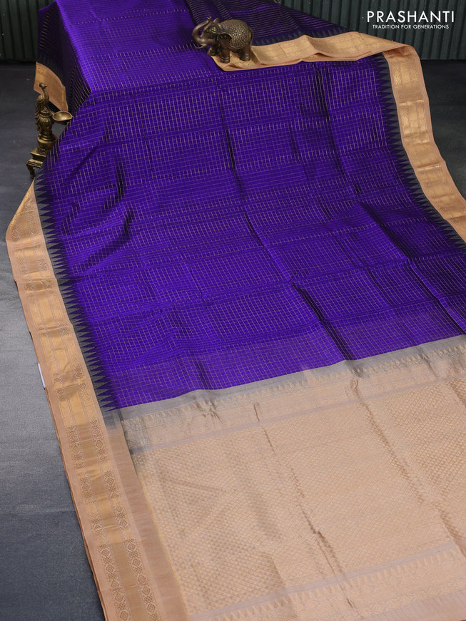 Silk cotton saree blue and sandal with allover zari checked pattern and temple zari woven korvai border