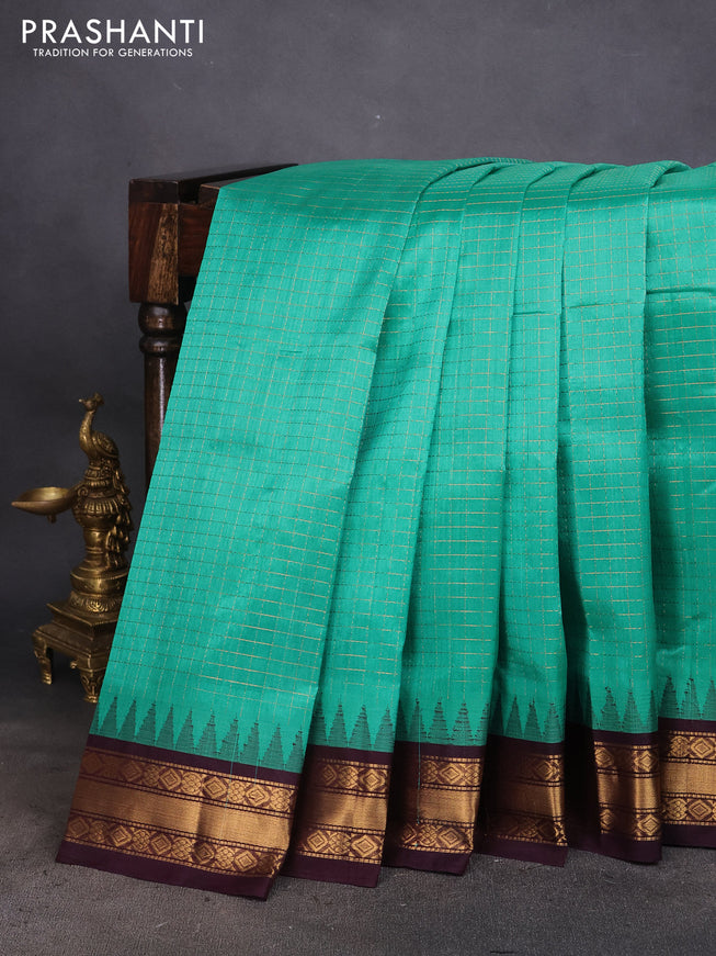 Silk cotton saree teal green shade and coffee brown with allover zari checked pattern and temple zari woven korvai border