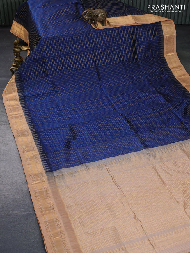 Silk cotton saree dark peacock blue and sandal with allover zari checked pattern and temple zari woven korvai border