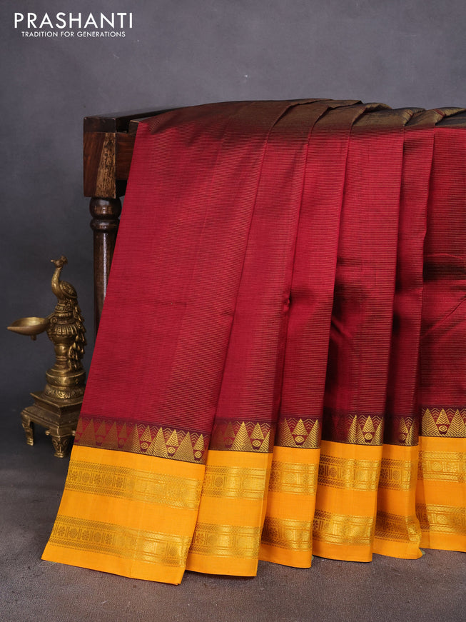 Silk cotton saree maroon and mango yellow with allover vairosi pattern and rettapet zari woven korvai border