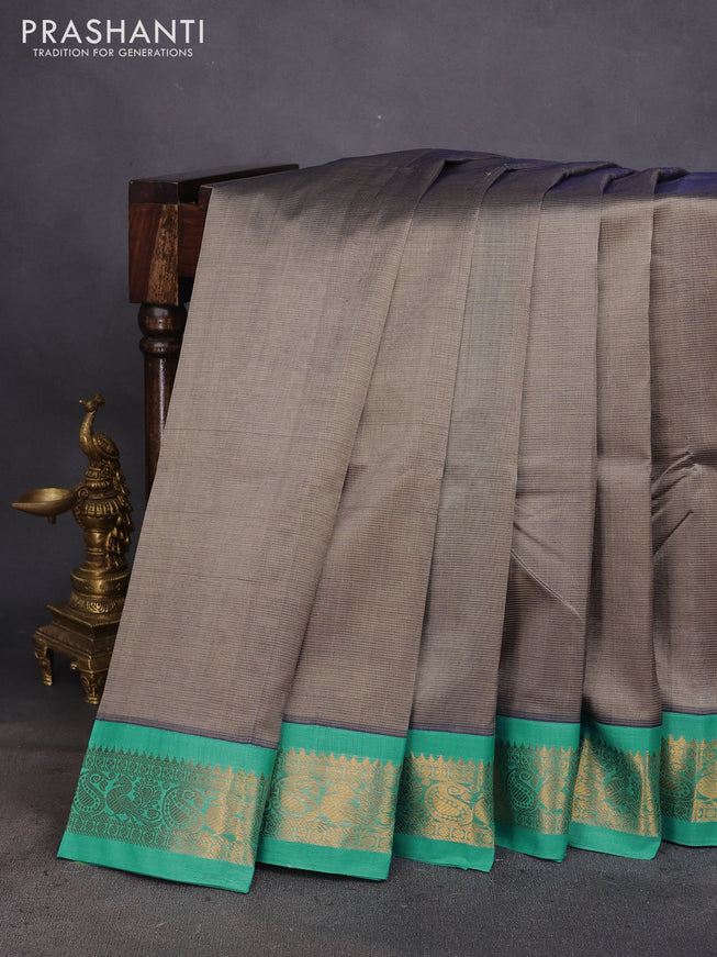 Silk cotton saree grey and teal blue shade with allover vairosi pattern and rich zari woven korvai border