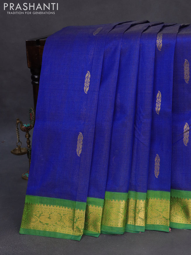 Silk cotton saree blue and green with allover vairosi pattern & buttas and rich zari woven korvai border