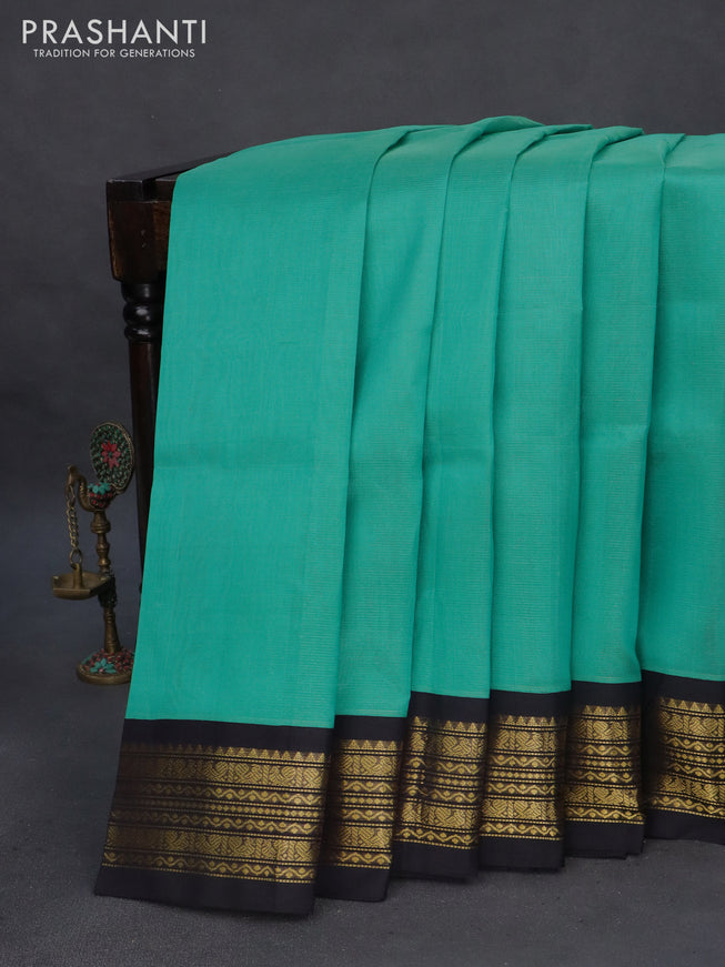 Silk cotton saree teal blue and deep jamun shade with allover vairosi pattern and zari woven korvai border