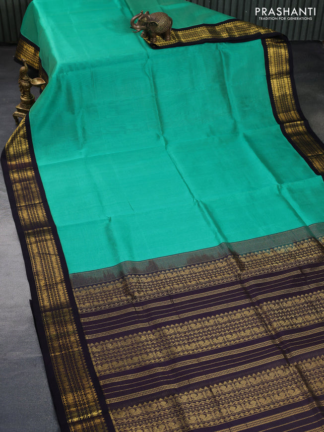 Silk cotton saree teal blue and deep jamun shade with allover vairosi pattern and zari woven korvai border