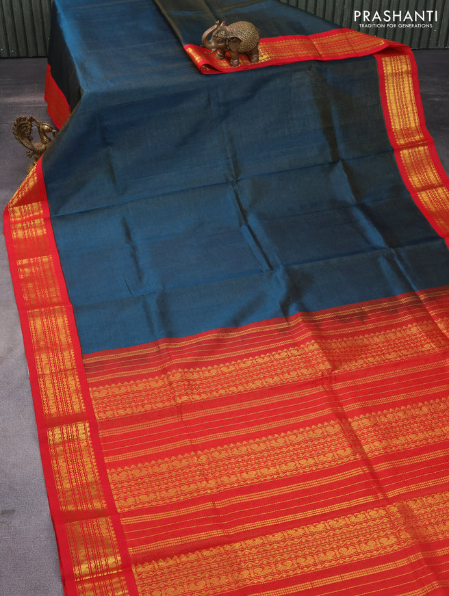 Silk cotton saree dark peacock blue and red with allover vairosi pattern and zari woven korvai border