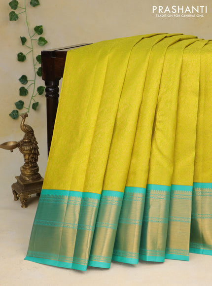 Pure kanchipuram silk saree lime yellow and teal blue with allover zari woven brocade weaves and zari woven border