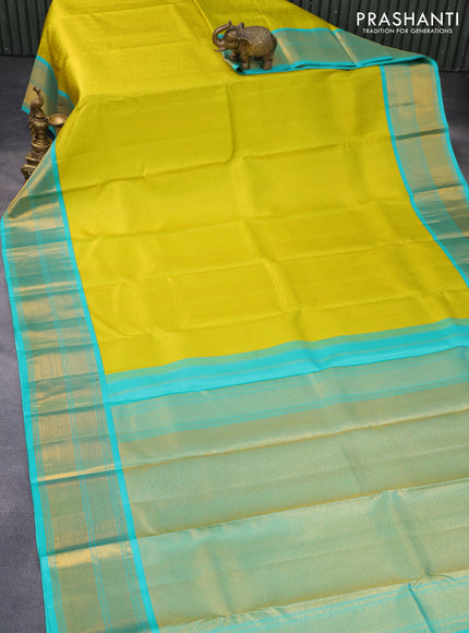 Pure kanchipuram silk saree lime yellow and teal blue with allover zari woven brocade weaves and zari woven border