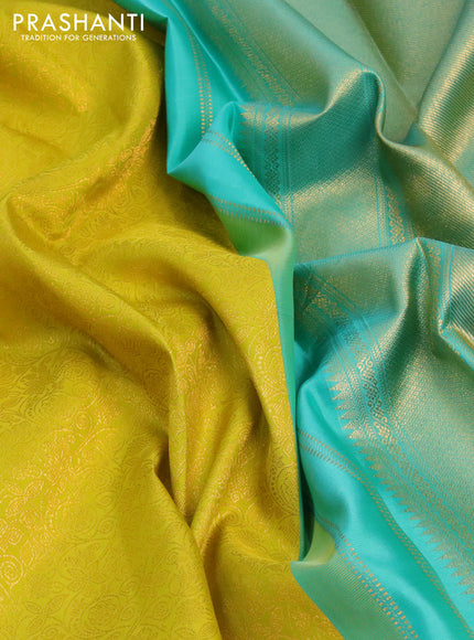 Pure kanchipuram silk saree lime yellow and teal blue with allover zari woven brocade weaves and zari woven border