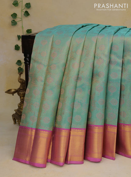 Pure kanchipuram tissue silk saree teal blue and mauve pink with allover zari woven floral weaves and zari woven border