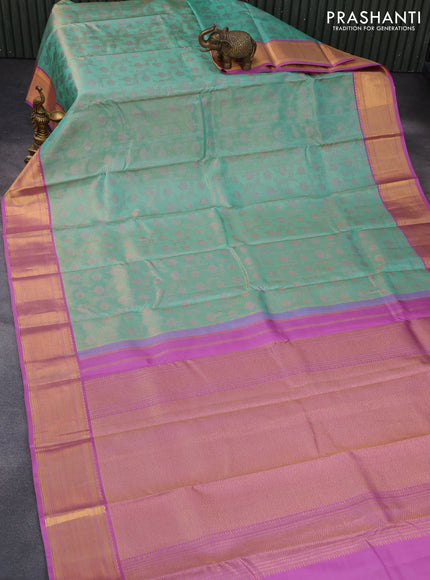 Pure kanchipuram tissue silk saree teal blue and mauve pink with allover zari woven floral weaves and zari woven border