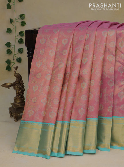 Pure kanchipuram tissue silk saree pink shade and teal blue with allover zari woven floral weaves and zari woven border