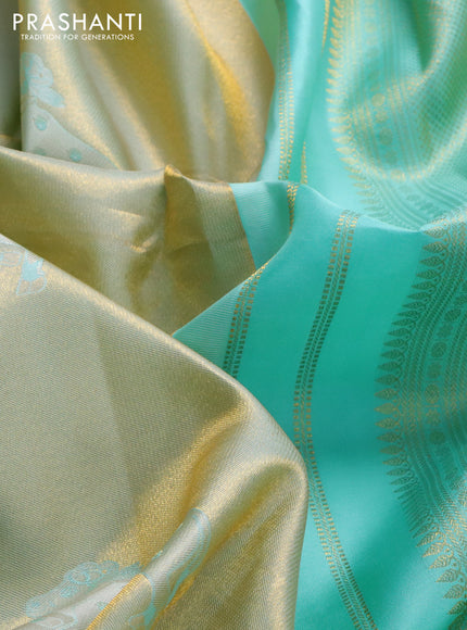 Pure kanchipuram tissue silk saree teal blue shade with zari weaves and zari woven border