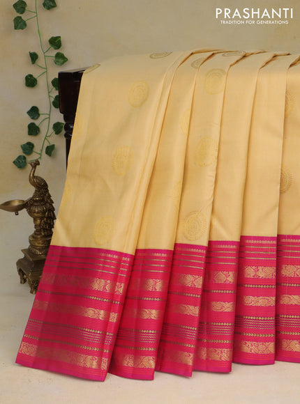 Pure kanchipuram silk saree sandal and pink with allover zari weaves & buttas and long zari woven border