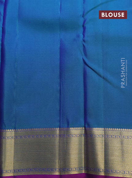 Pure kanchipuram silk saree dual shade of bluish green and purple with zari woven buttas and zari woven border