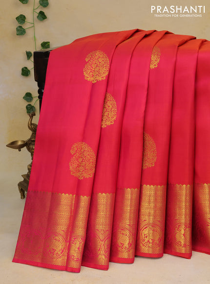 Pure kanchipuram silk saree dual shade of pinkish orange with zari woven buttas and zari woven border