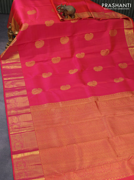 Pure kanchipuram silk saree dual shade of pinkish orange with zari woven buttas and zari woven border