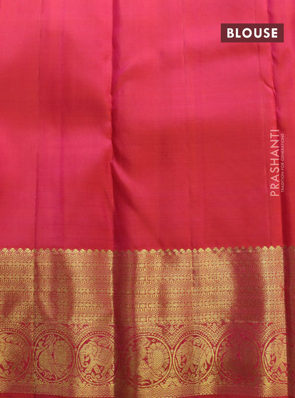 Pure kanchipuram silk saree dual shade of pinkish orange with zari woven buttas and zari woven border