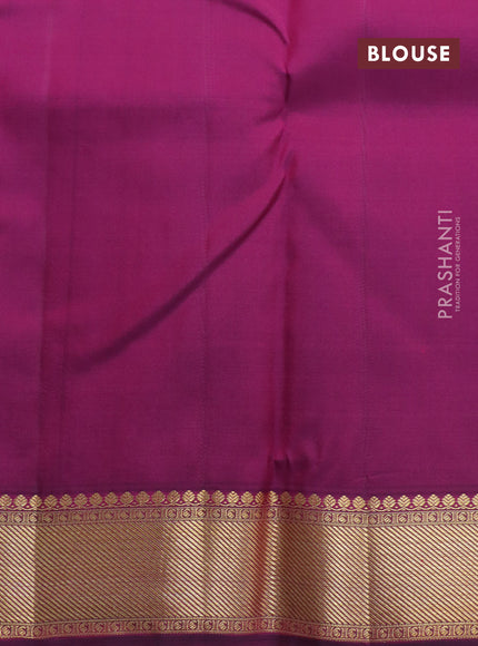 Pure kanchipuram silk saree dual shade of pinkish orange and purple with zari woven buttas and zari woven border