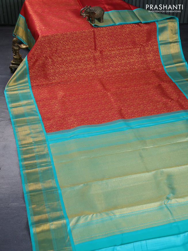 Pure kanchipuram silk saree red and teal blue with allover zari woven brocade weaves and zari woven border