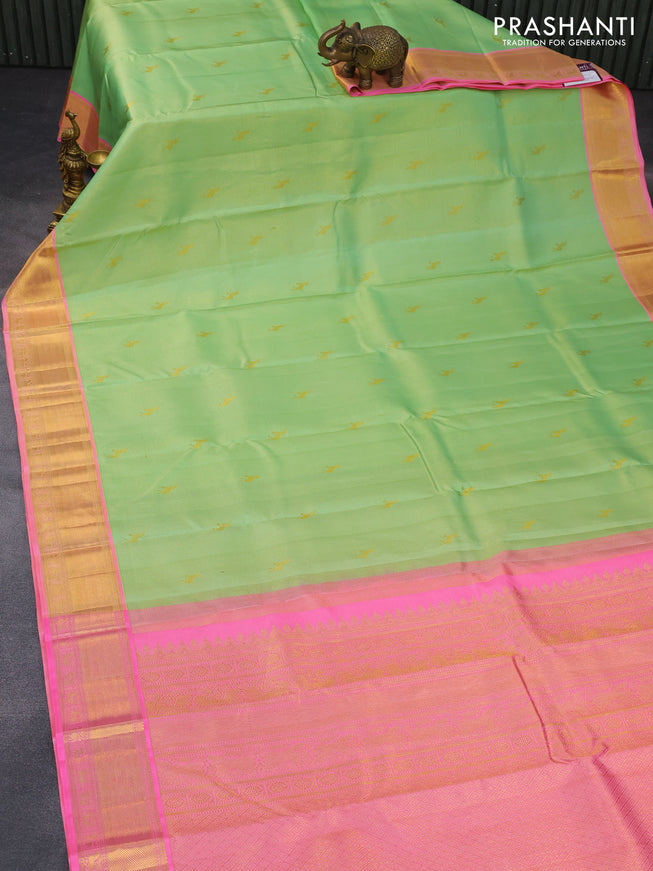 Pure kanchipuram silk saree light green and candy pink with allover zari weaves & buttas and zari woven border