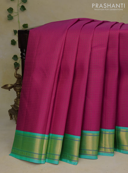 Pure kanchipuram silk saree pink and teal blue with allover zari checks & self emboss and zari woven border