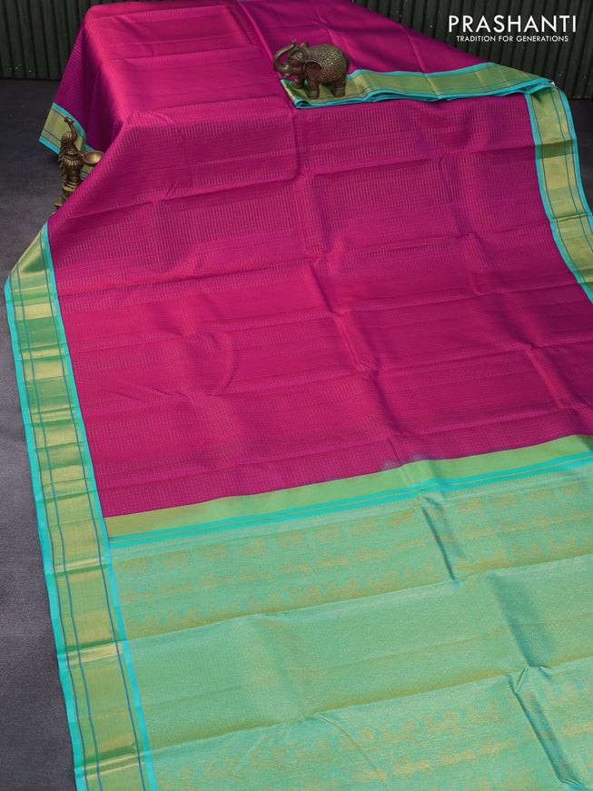 Pure kanchipuram silk saree pink and teal blue with allover zari checks & self emboss and zari woven border