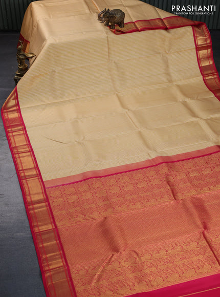 Pure kanchipuram silk saree sandal and pink with allover zari checks & self emboss and zari woven border