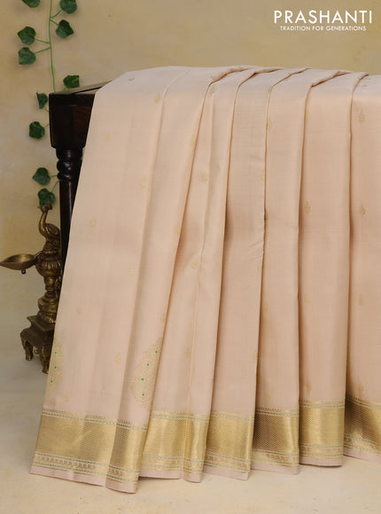 Pure kanchipuram silk saree cream with zari woven buttas and zari woven border