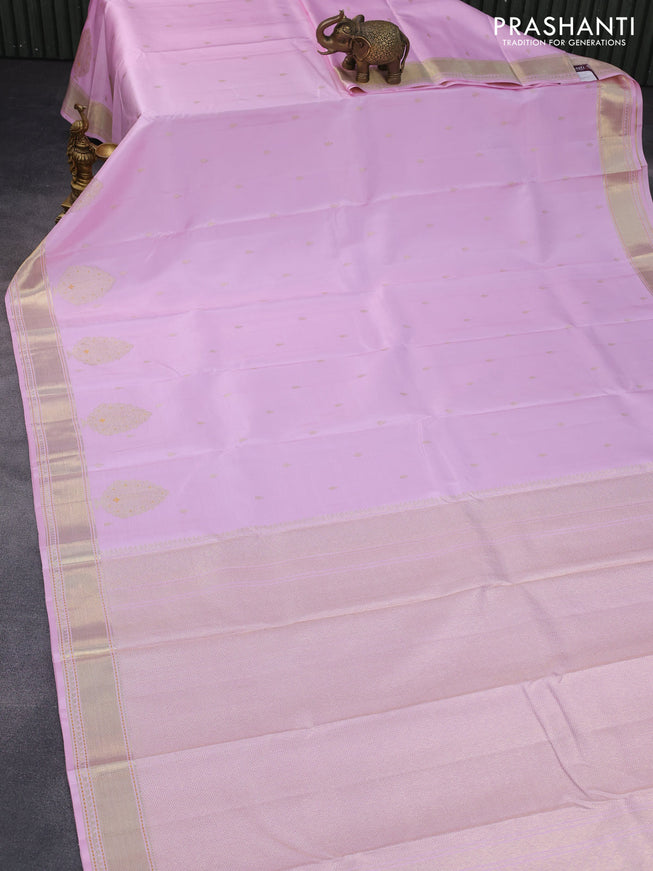 Pure kanchipuram silk saree light pink with zari woven buttas and zari woven border