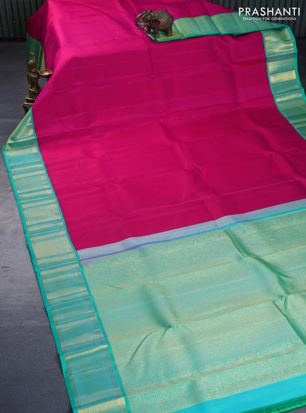 Pure kanchipuram silk saree pink and teal green with plain body and zari woven border