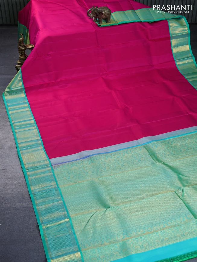 Pure kanchipuram silk saree pink and teal green with plain body and zari woven border