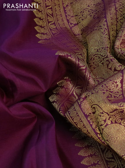 Pure kanchipuram silk saree deep purple with zari woven buttas and paisley zari woven border