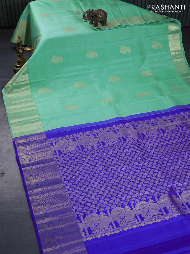 Pure kanchipuram silk saree teal blue and royal blue with paisley zari woven border and zari woven border