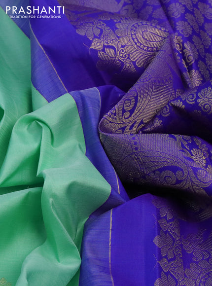 Pure kanchipuram silk saree teal blue and royal blue with paisley zari woven border and zari woven border