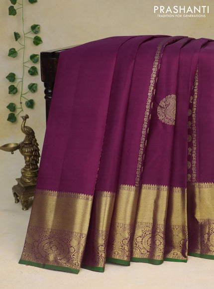 Pure kanchipuram silk saree wine shade and green with allover zari weaves and zari woven border