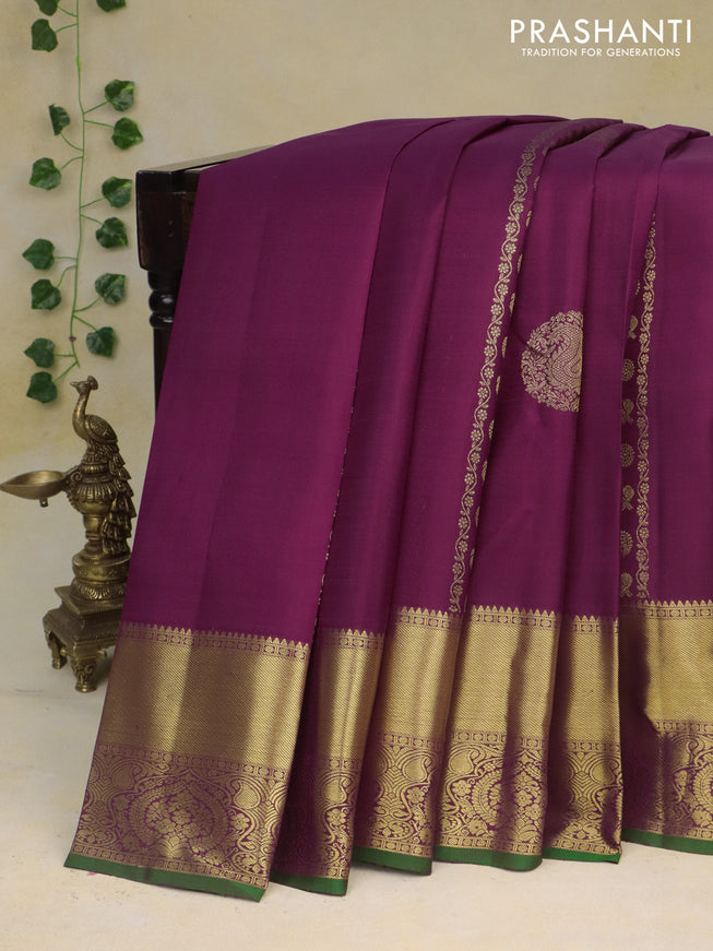 Pure kanchipuram silk saree wine shade and green with allover zari weaves and zari woven border