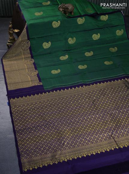 Pure kanchipuram silk saree green and dark blue with paisley zari woven buttas and rich zari woven border