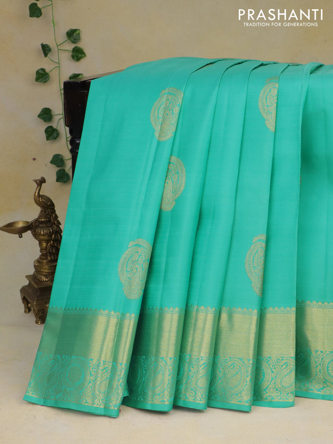 Pure kanchipuram silk saree teal blue with zari woven buttas and floral zari woven border