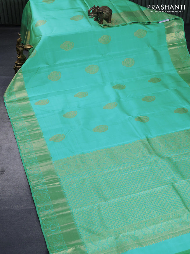 Pure kanchipuram silk saree teal blue with zari woven buttas and floral zari woven border