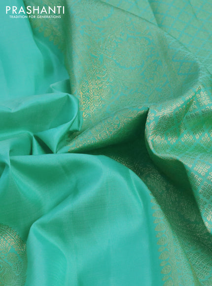 Pure kanchipuram silk saree teal blue with zari woven buttas and floral zari woven border