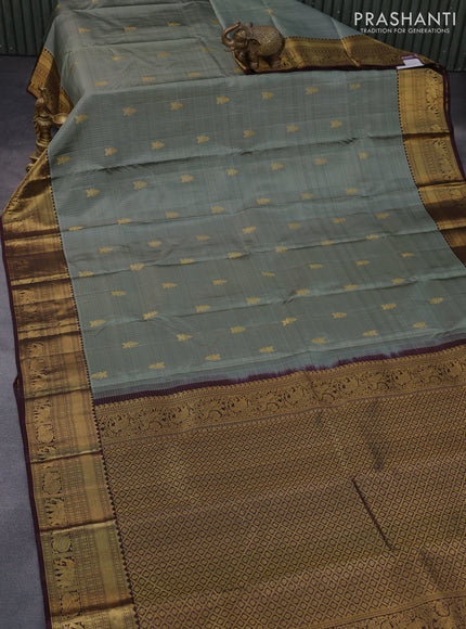 Pure kanchipuram silk saree grey shade and deep maroon with allover small zari checks & buttas and annam & elephant zari woven border