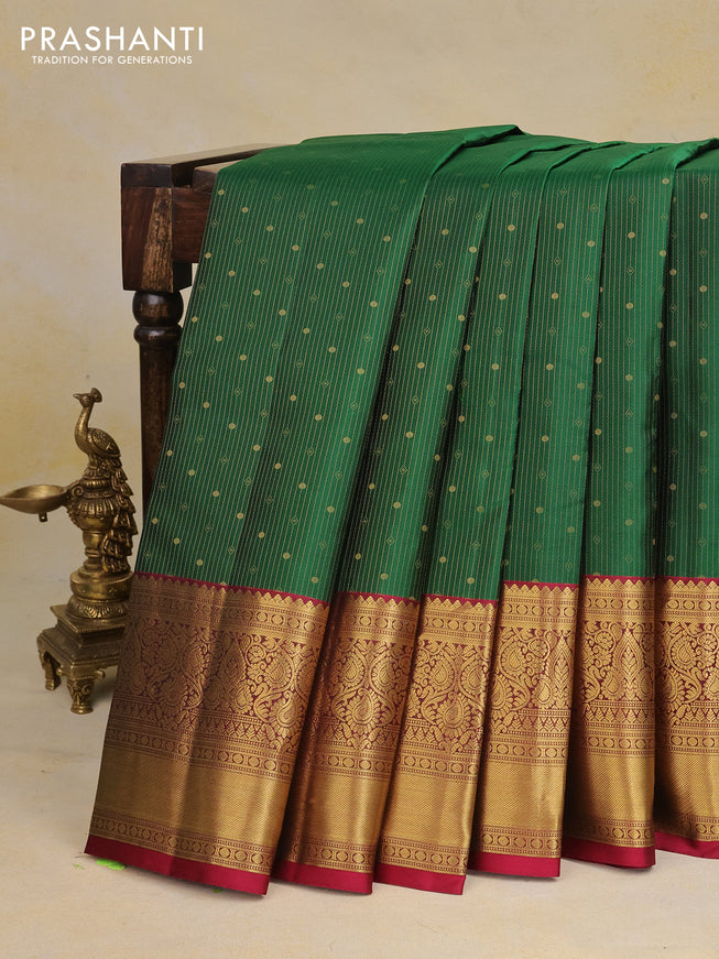 Pure kanchipuram silk saree green and maroon with allover zari weaves & buttas and long zari woven border