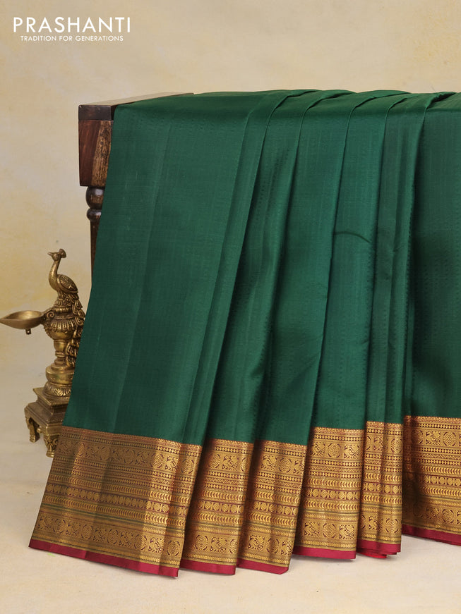 Pure kanchipuram silk saree green and maroon with allover self emboss and zari woven border