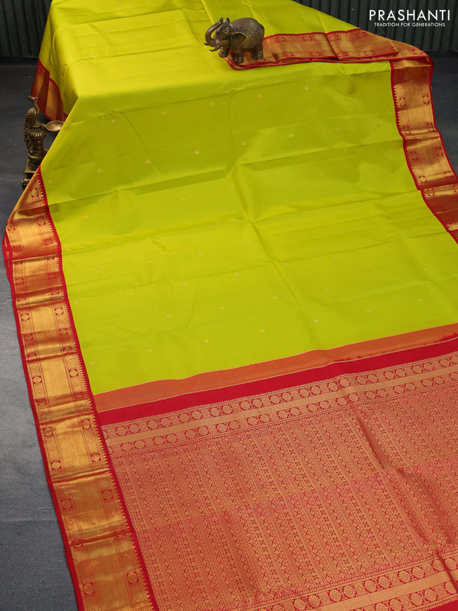 Pure kanchipuram silk saree lime yellow and red with zari woven buttas and zari woven korvai border